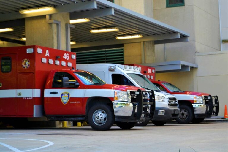 three ambulances parked at entrance of hospital